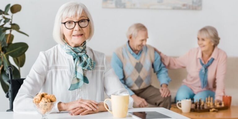 Senior Woman with Coffee and Snacks at Independent Living Facility