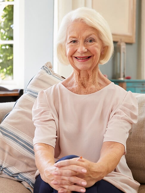 Elderly Man Smiling at Nursing Home in Oxford